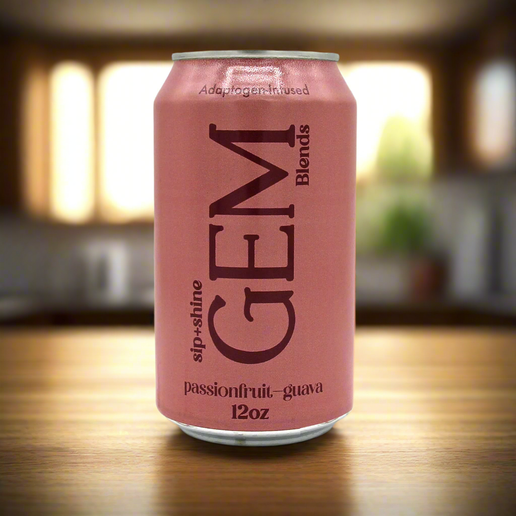 Pink can of GEM Blends with 'passionfruit guava' flavor in a kitchen
